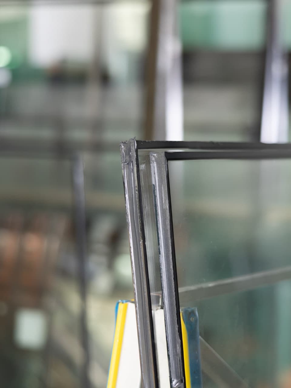 Two panes and a spacer, sealed at the corner in the shop