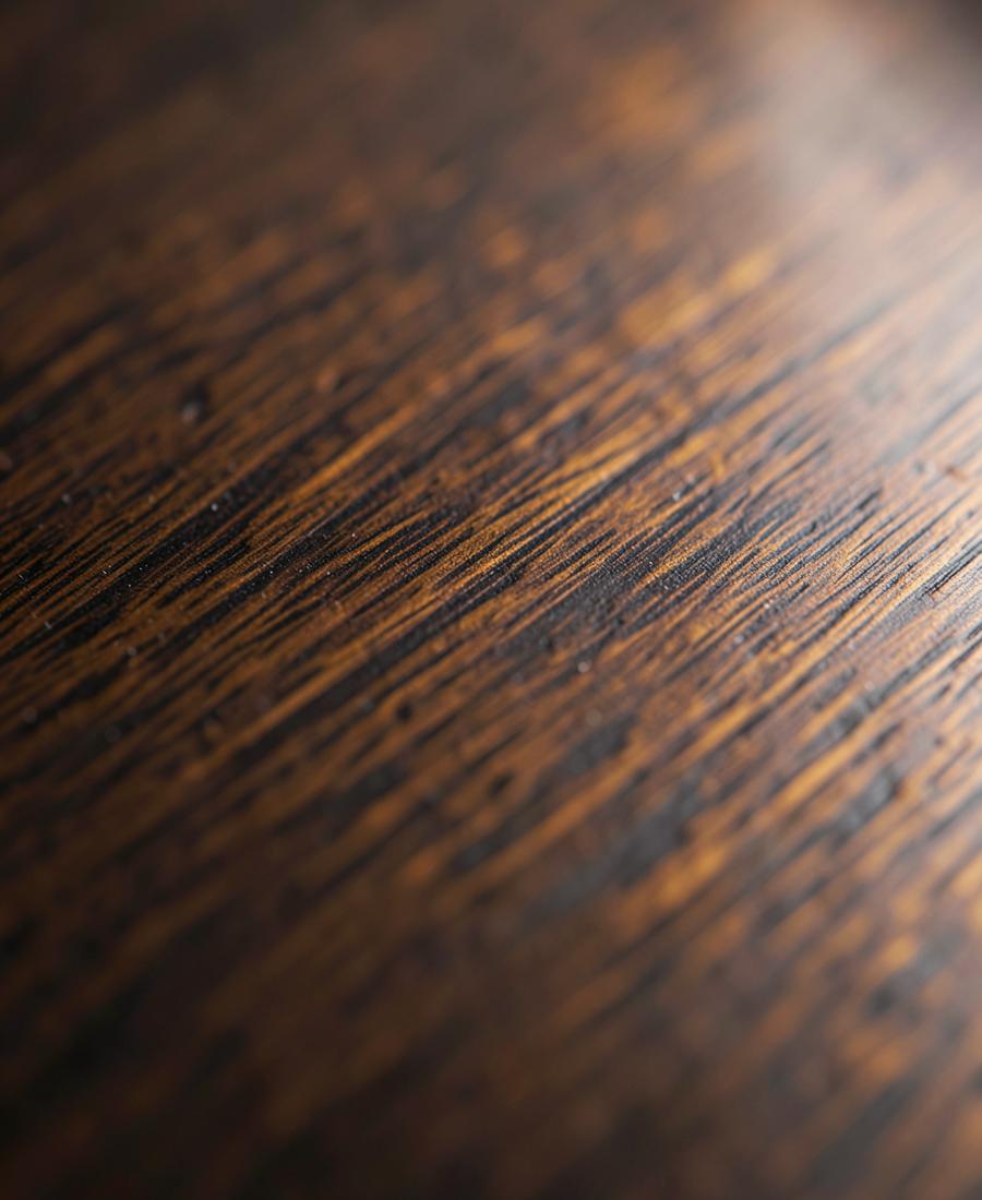 Bronze anodized surface under raking light